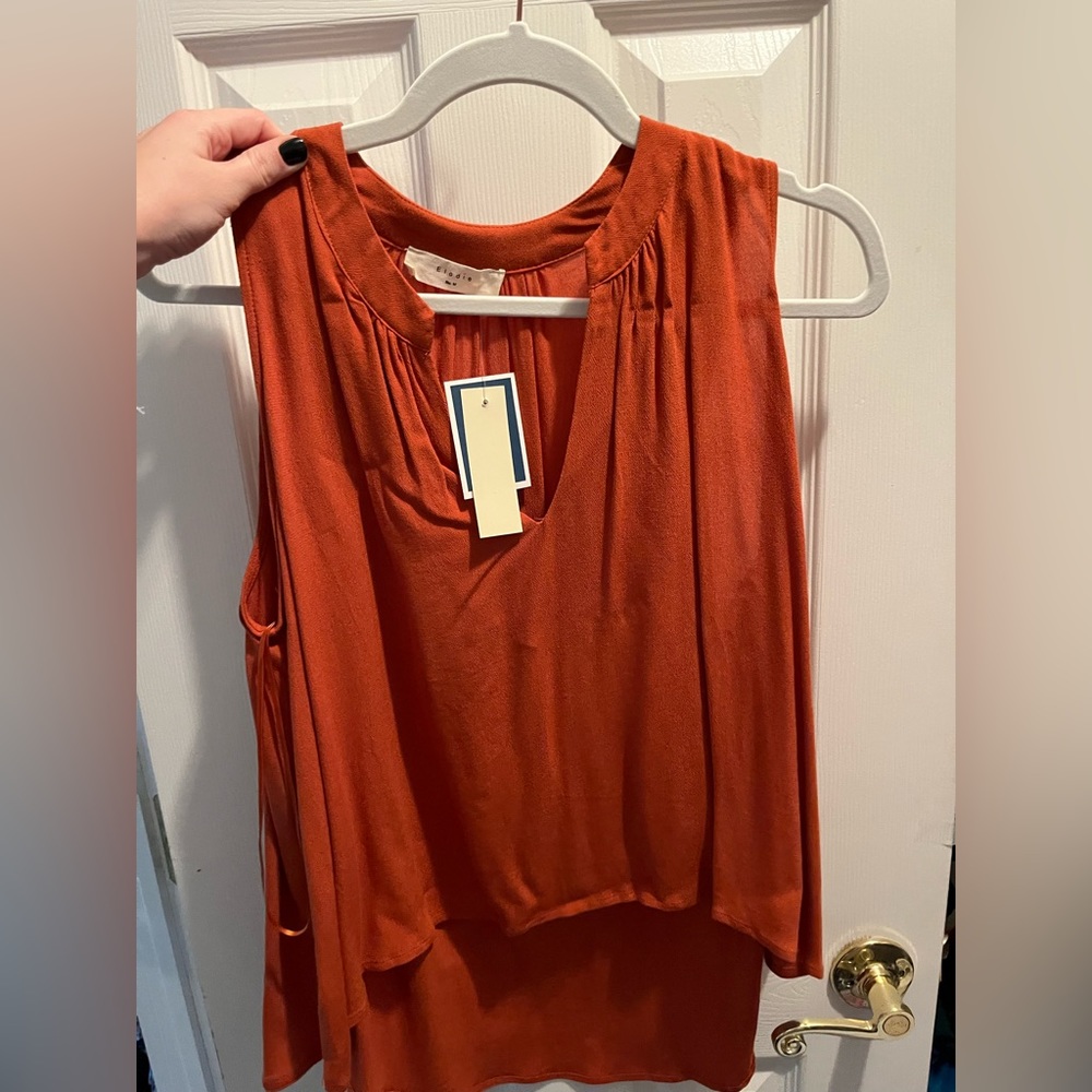 Orange blouse top